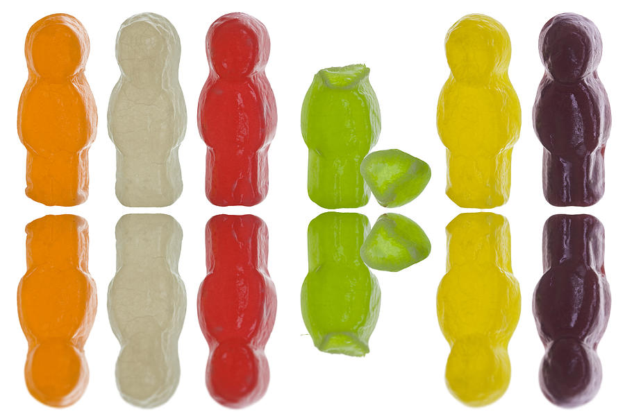 Jelly babies with one candy figure headless Photograph by Alex Bramwell