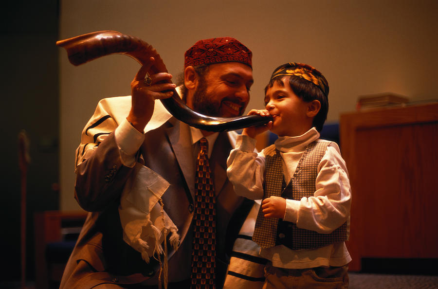 Jewish Father and Son with a Shofar Photograph by Geoff Manasse