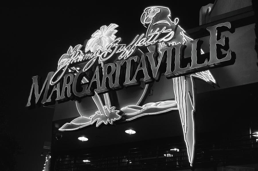 Jimmy Buffett Margaritaville Neon Sign Las Vegas Strip Black and White Photograph by Shawn OBrien