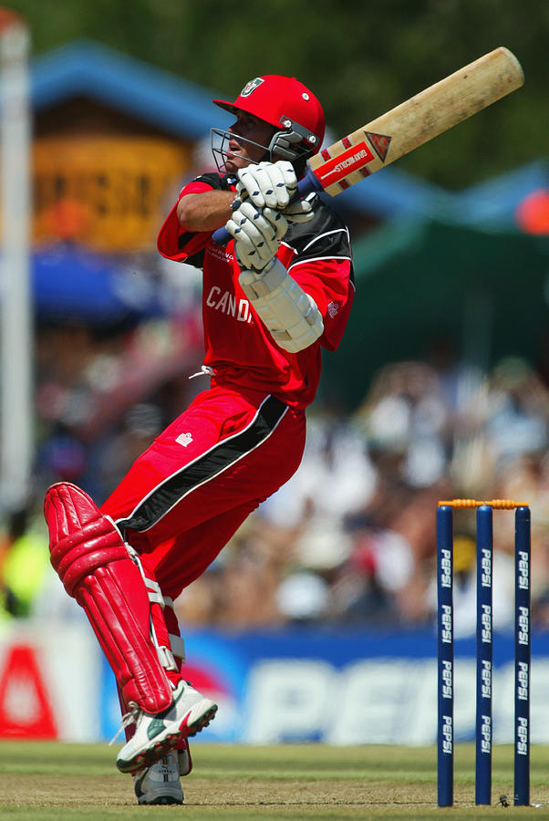 John Davison of Canada hooks a six on his way to scoring the fastest hundred in World Cup history Photograph by Mike Hewitt