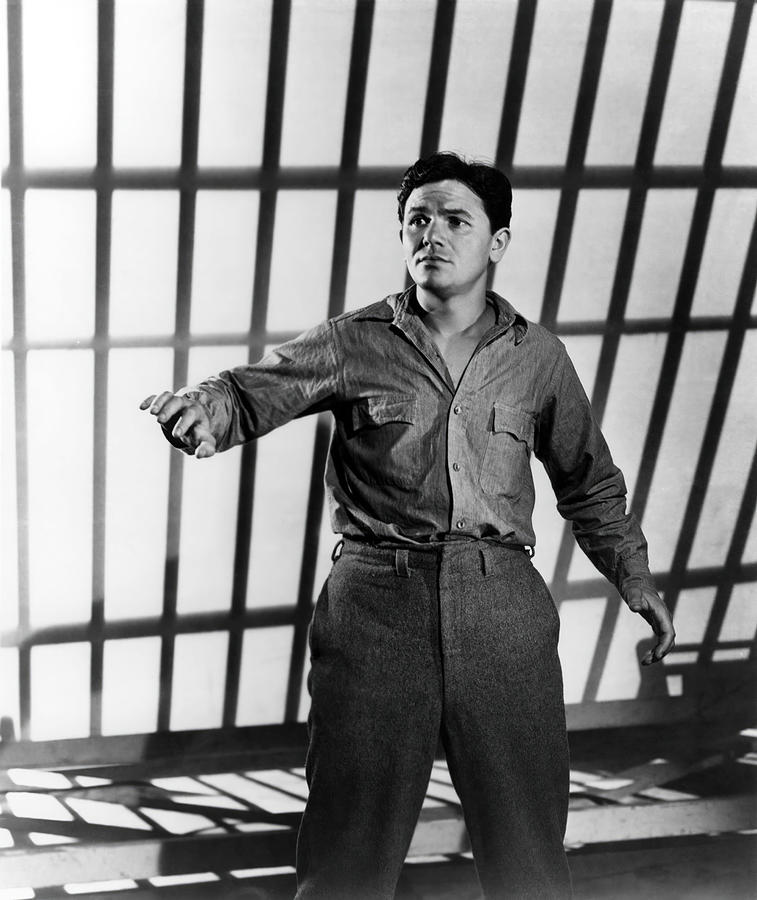 JOHN GARFIELD in CASTLE ON THE HUDSON -1940-, directed by ANATOLE LITVAK. Photograph by Album