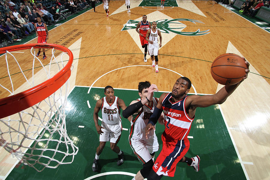 John Wall and Ersan Ilyasova Photograph by Gary Dineen John Wall and Ersan Ilyasova Photograph by Gary Dineen