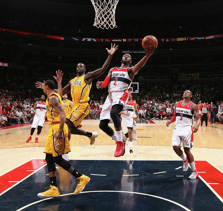 John Wall and Lance Stephenson Photograph by Ned Dishman John Wall and Lance Stephenson Photograph by Ned Dishman