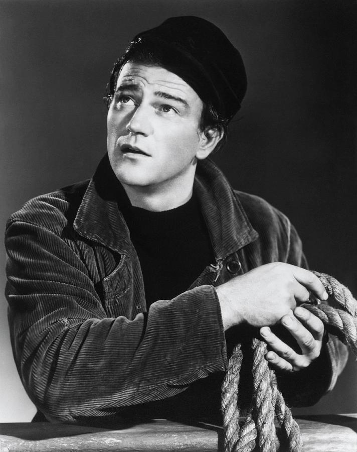 JOHN WAYNE in THE LONG VOYAGE HOME -1940-, directed by JOHN FORD. Photograph by Album