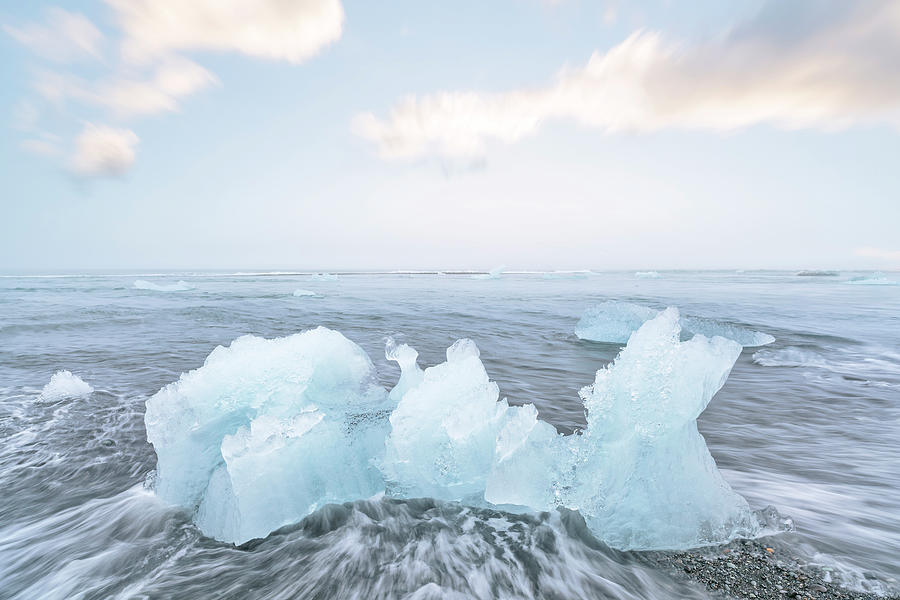 Jokulsarlon icebergs beach Photograph by Giovanni Allievi