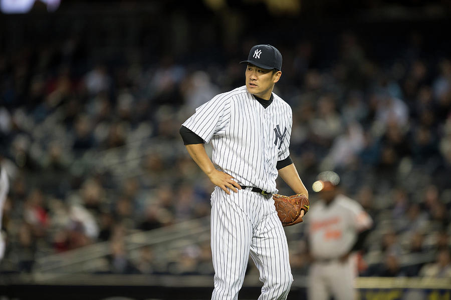 Jonathan Schoop and Masahiro Tanaka Photograph by Rob Tringali Jonathan Schoop and Masahiro Tanaka Photograph by Rob Tringali