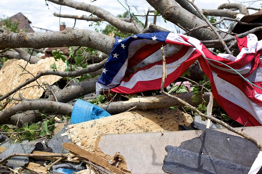 Joplin Missouri deadly F5 Tornado debris piled and American Flag Photograph by Eyecrave Productions