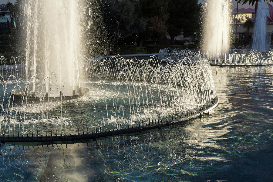 Joyous Sunlit Splashes - Caesars Palace Fountains Las Vegas Photograph by Georgia Mizuleva