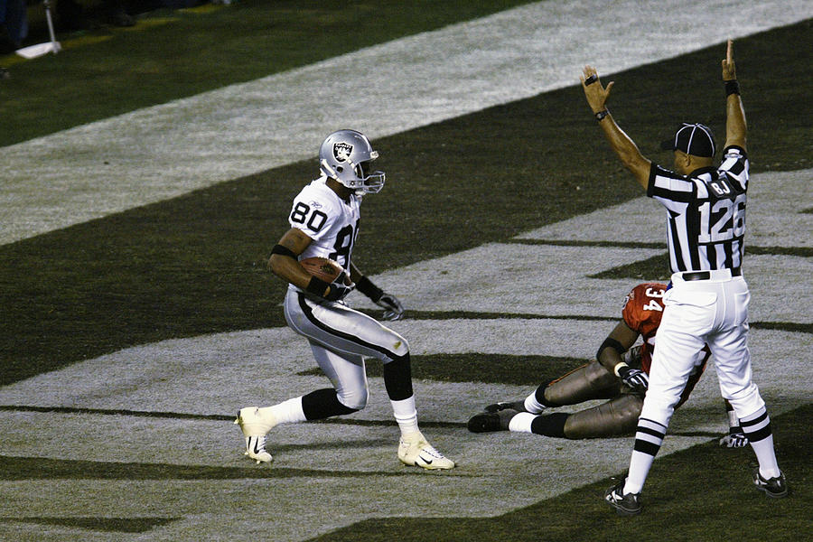J.Rice 48 yard touchdown pass from R.Gannon  Photograph by Stephen Dunn