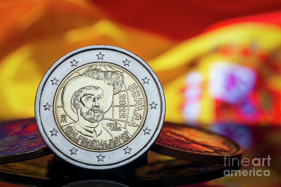 Juan Sebastian de Elcano Portrait from Spain 2 Euro 2022 Coin. Spanish Flag in the background. Macro Photograph by Pablo Avanzini