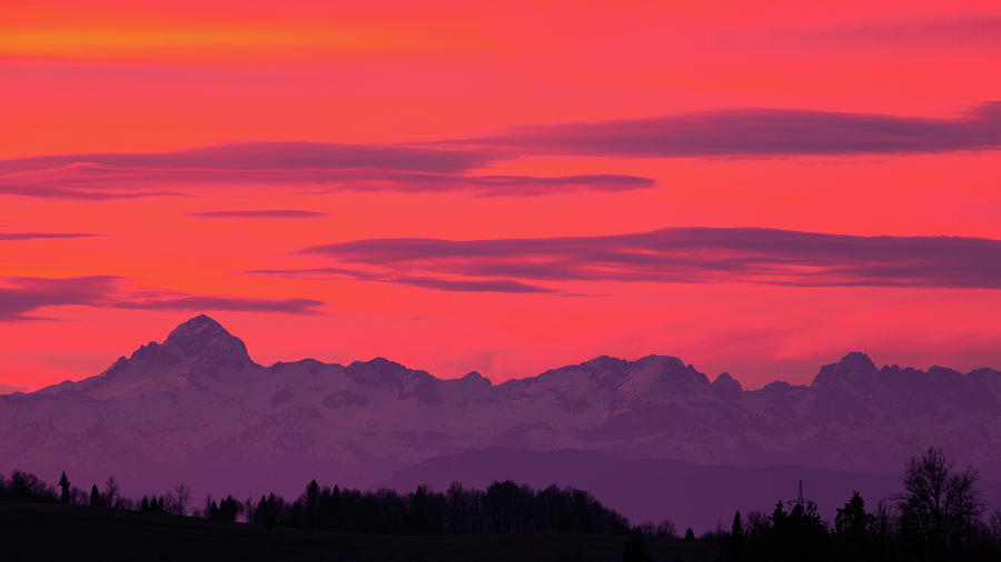 Julian Alps at sunset Photograph by Ian Middleton