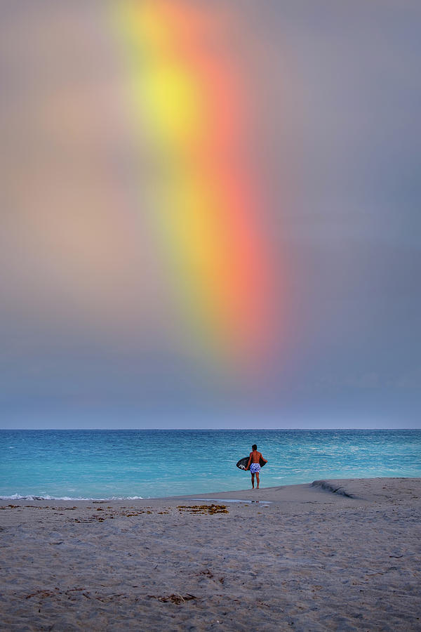 Juno Beach Skim Boarder Blue Water Rainbow Over the Ocean Photograph by Kim Seng
