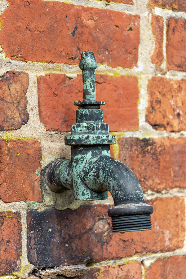 Just a tap on the wall Photograph by Steev Stamford