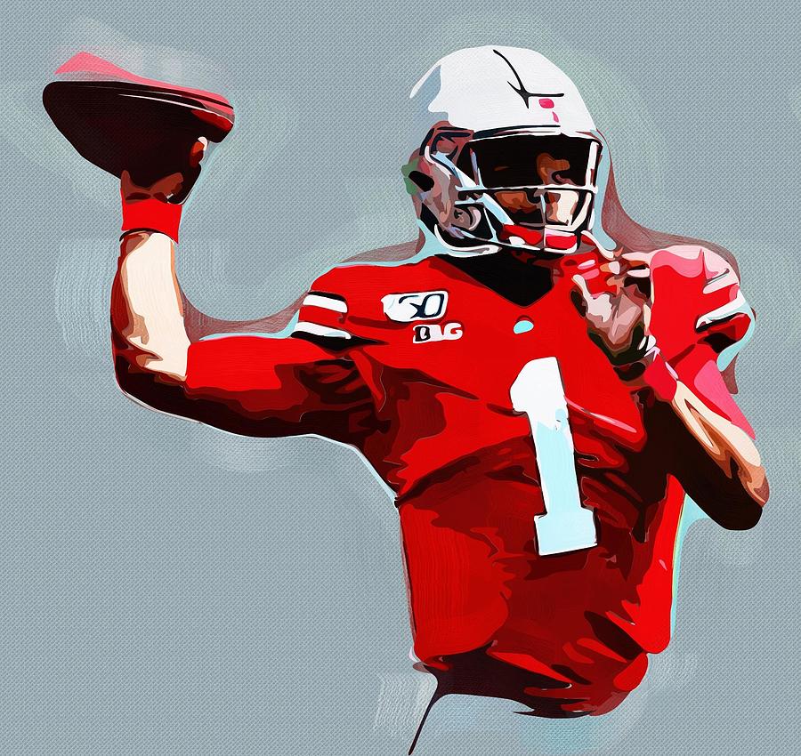 Download Ohio State quarterback Justin Fields delivers a pass