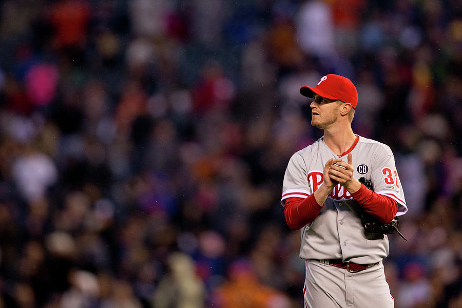 Justin Morneau and Kyle Kendrick Photograph by Justin Edmonds