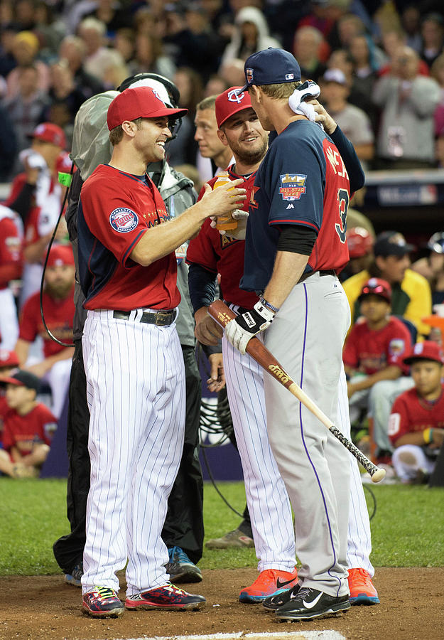 Justin Morneau, Glen Perkins, and Brian Dozier Photograph by Ron Vesely Justin Morneau, Glen Perkins, and Brian Dozier Photograph by Ron Vesely