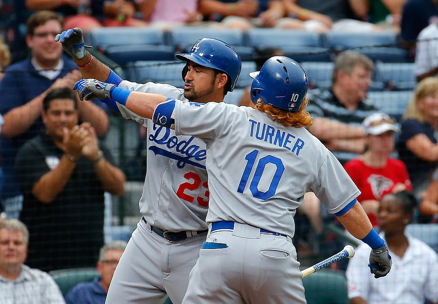 Justin Turner and Adrian Gonzalez Photograph by Kevin C. Cox