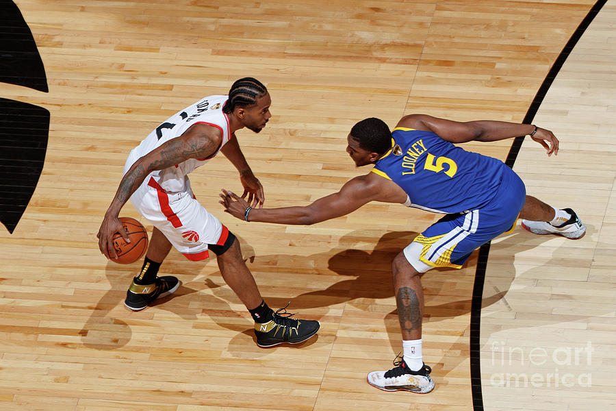 Kawhi Leonard and Kevon Looney Photograph by Mark Blinch