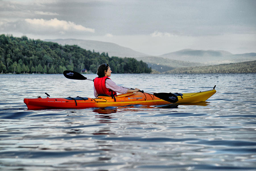Kayaker on the Lake Photograph by Russ Considine