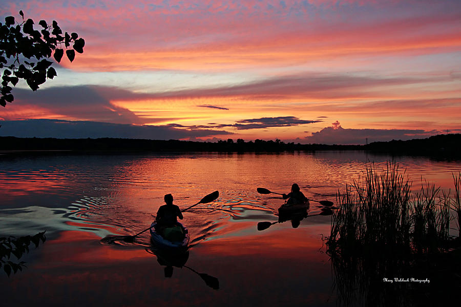 Kayaks at Red Sunset Photograph by Mary Walchuck