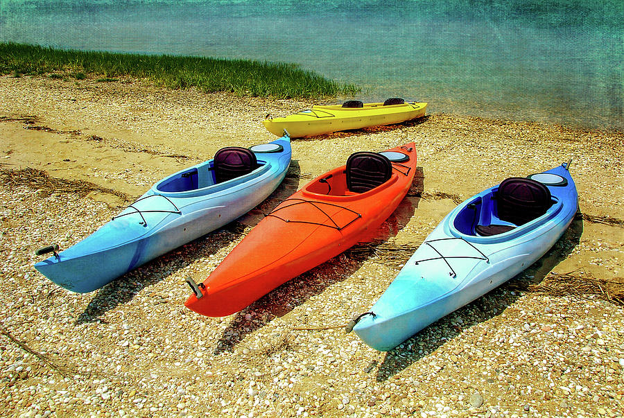 Kayaks On The Shore Photograph by Cathy Kovarik