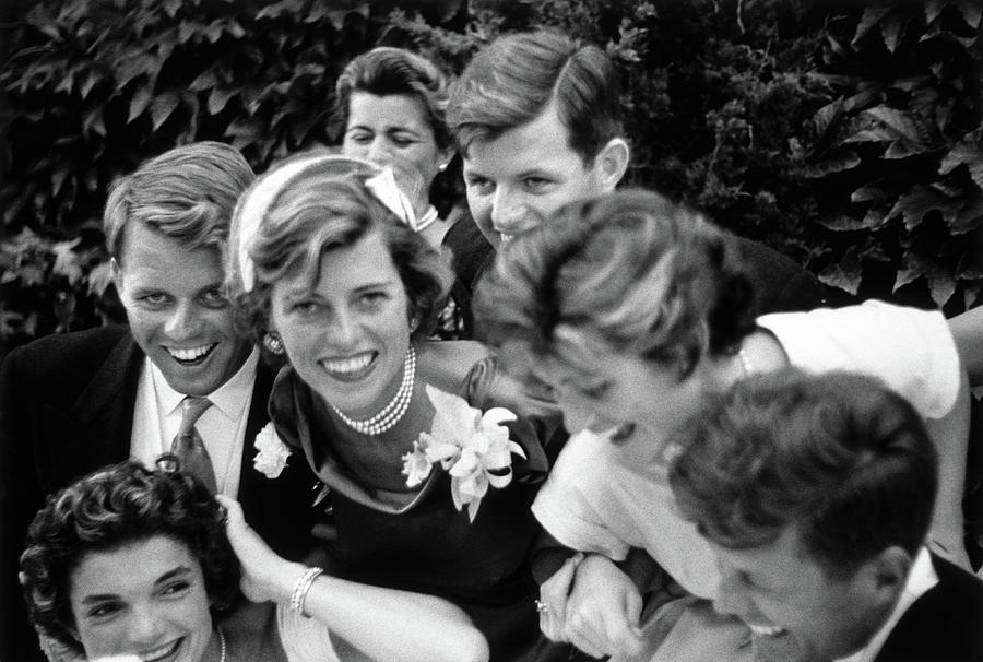 Kennedy Family Embracing John and Jackie At Wedding - 1953 Photograph by War Is Hell Store
