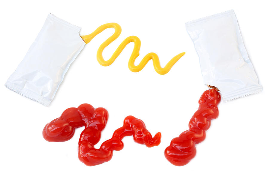 Ketchup and Mustard Packets Photograph by Cveltri