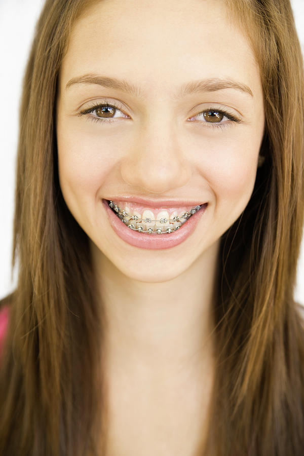 Teen girl with braces Photograph by Paul Vozdic - Fine Art America