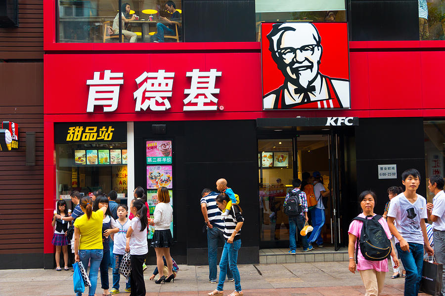 KFC chain store with customers on chinese national day Photograph by Loveguli