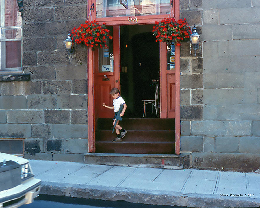 Kid in Doorway - Montreal 1987 Photograph by Mark Berman