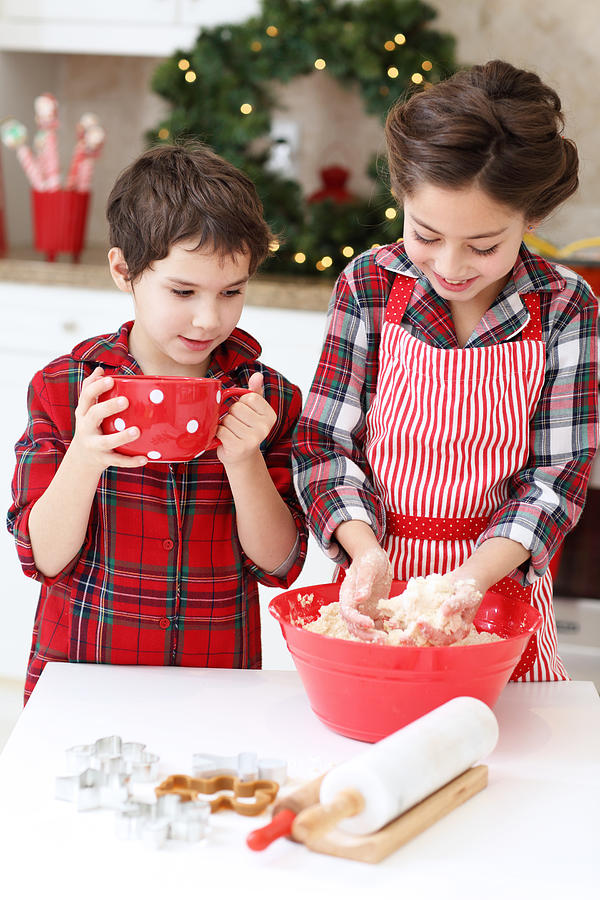 Kids baking sugar cookies Photograph by Weekend Images Inc.
