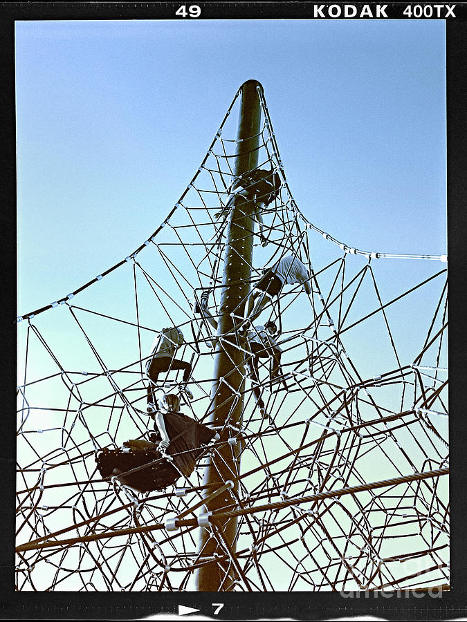 Kids Climbing Tower Photograph by Martin Konopacki