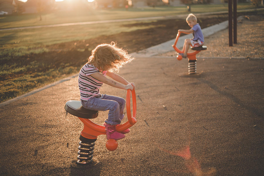 Kids Playing at a Playground Photograph by Annie Otzen