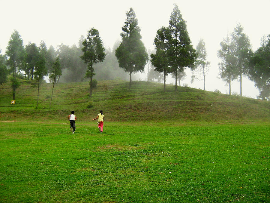 Kids playing in natural environment Photograph by Veena Nair