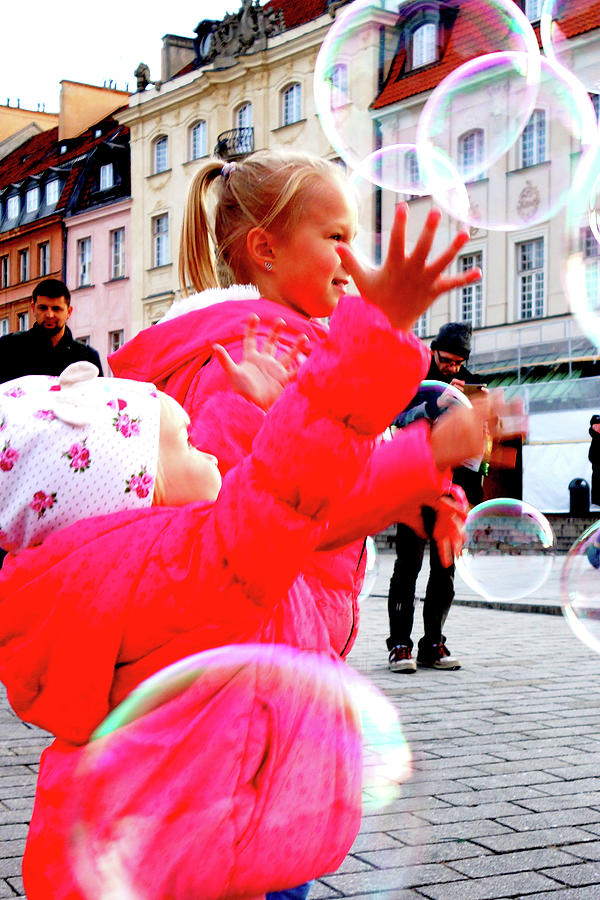 Kids Playing With Bubbles In Warsaw, Poland Photograph by John Siest