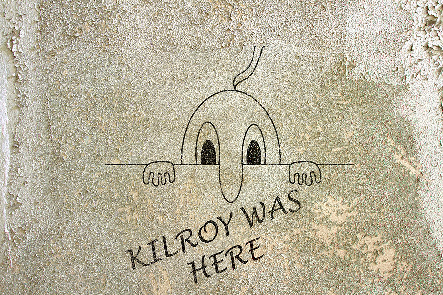 Kilroy was here on grunge concrete wall Photograph by Karen Foley