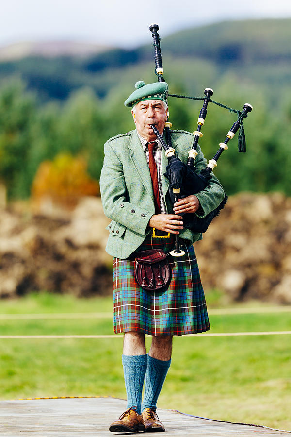 Kilted male scottish piper with bagpipes Photograph by Lucentius