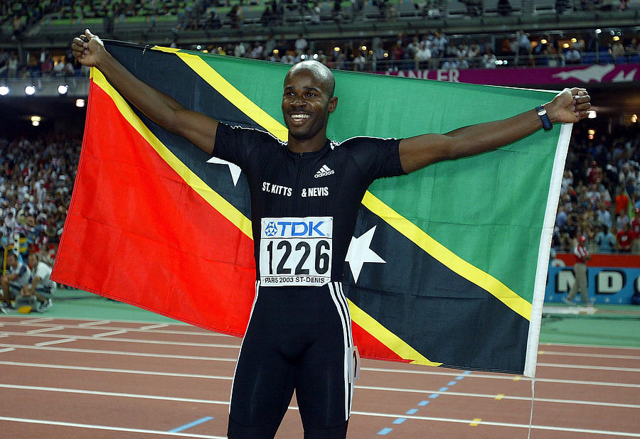 Kim Collins of Saint Kitts and Nevis celebrates Photograph by Michael Steele