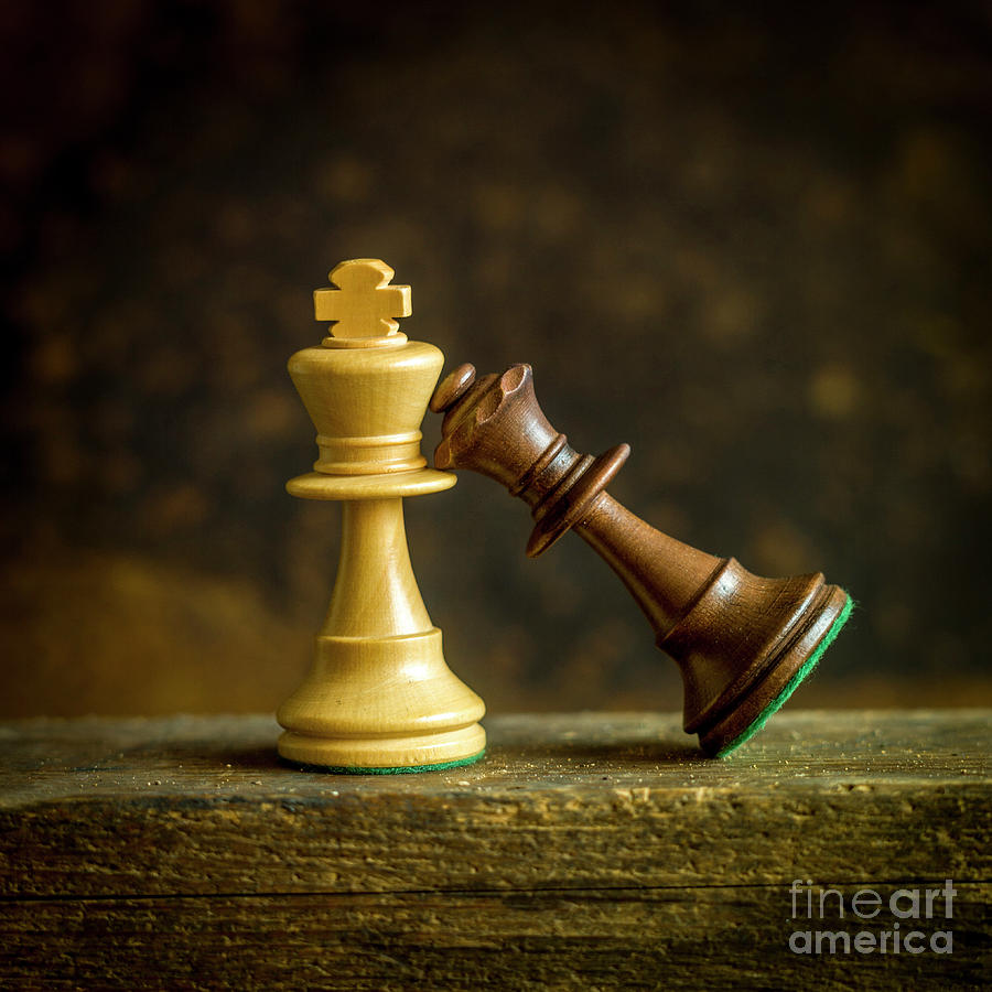 Chess queen and king pieces Stock Photo by magraphics