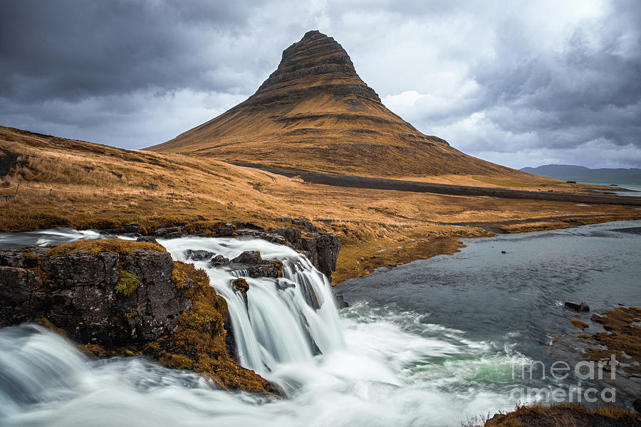 Kirkjufell mountain and Kirkjufellfoss waterfall, Snaefellsnes peninsula, Iceland. Long exposure shot in autumn. Photograph by Jane Rix Kirkjufell mountain and Kirkjufellfoss waterfall, Snaefellsnes peninsula, Iceland. Long exposure shot in autumn. Photograph by Jane Rix