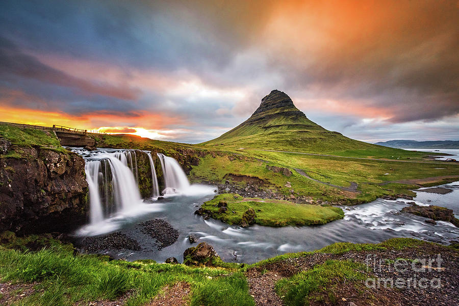 Kirkjufell mountain in Iceland at sunset Photograph by Thomas Jones