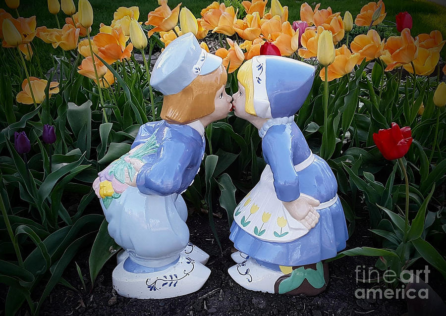 Kissing in the Tulips Photograph by Mark Triplett