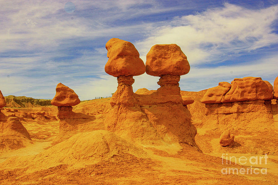 Kissing road stools goblin valley Photograph by Jeff Swan