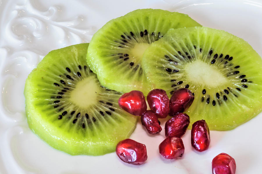 Kiwi Slices and Pomegranate Seeds Photograph by Lindley Johnson