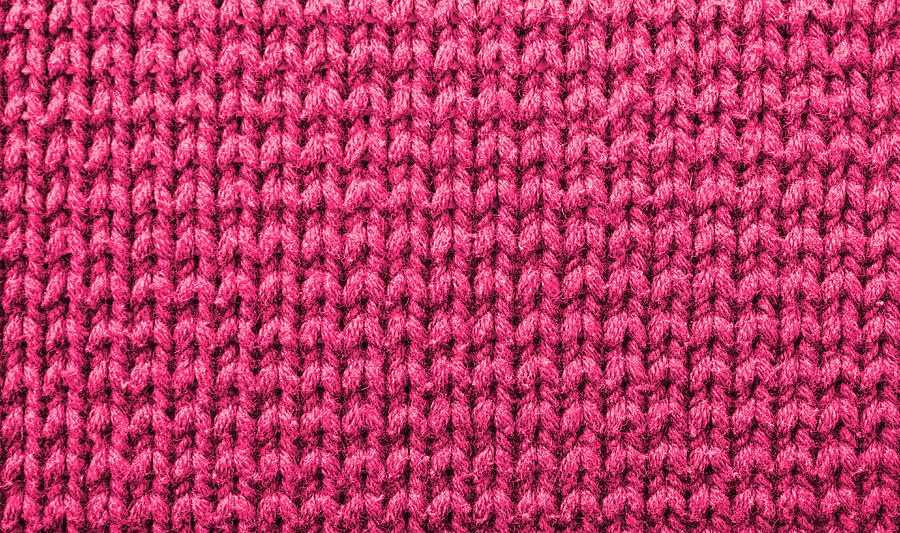Knitted Pink Background. Yarn Texture. Vertical Knitting Photograph