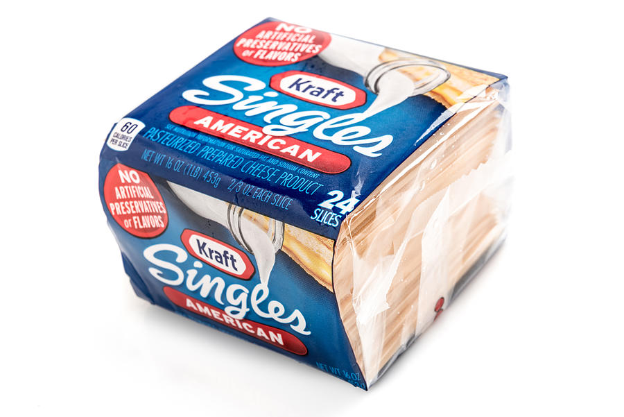 Kraft Brand Single slices of American Cheese Photograph by Juanmonino