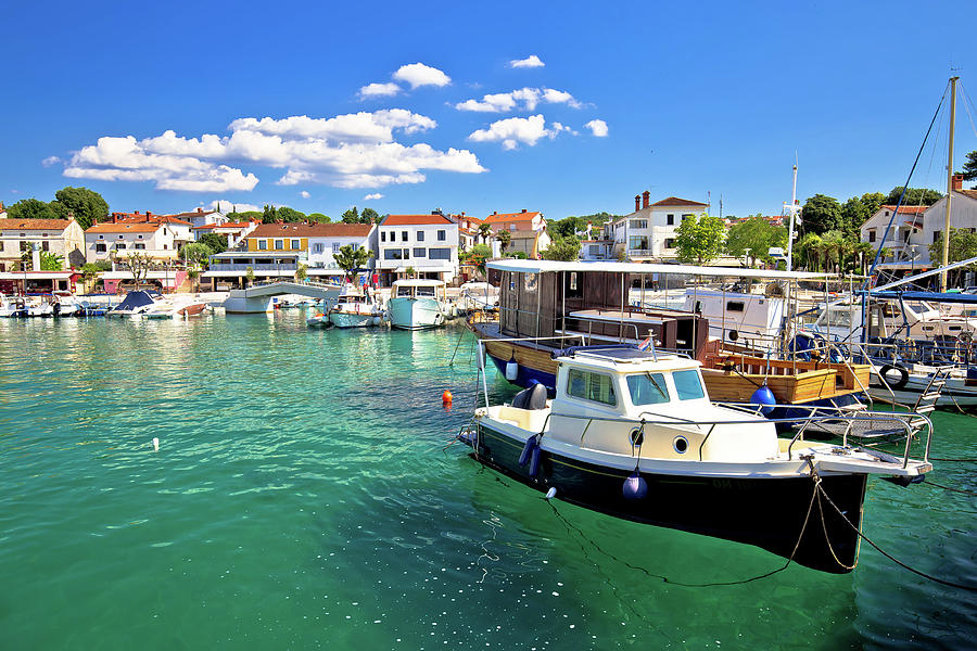 Krk island. Town of Njivice turquoise harbor and waterfront  Photograph by Brch Photography