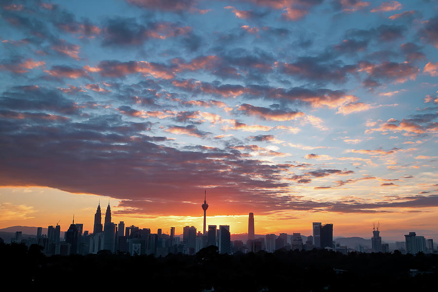 Architecture Photograph - Kuala Lumpur Cityscape with dramatic cloud during sunrise by Hafiz Mustapha