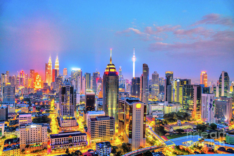 Kuala Lumpur, Malaysia. Night skyline aerial view. Photograph by Luciano Mortula