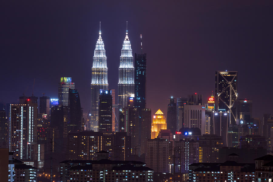 Kuala Lumpur, the capital of Malaysia. Its modern skyline is dominated by the 451m-tall KLCC, a pair of glass-and-steel-clad skyscrapers. Photograph by Shaifulzamri